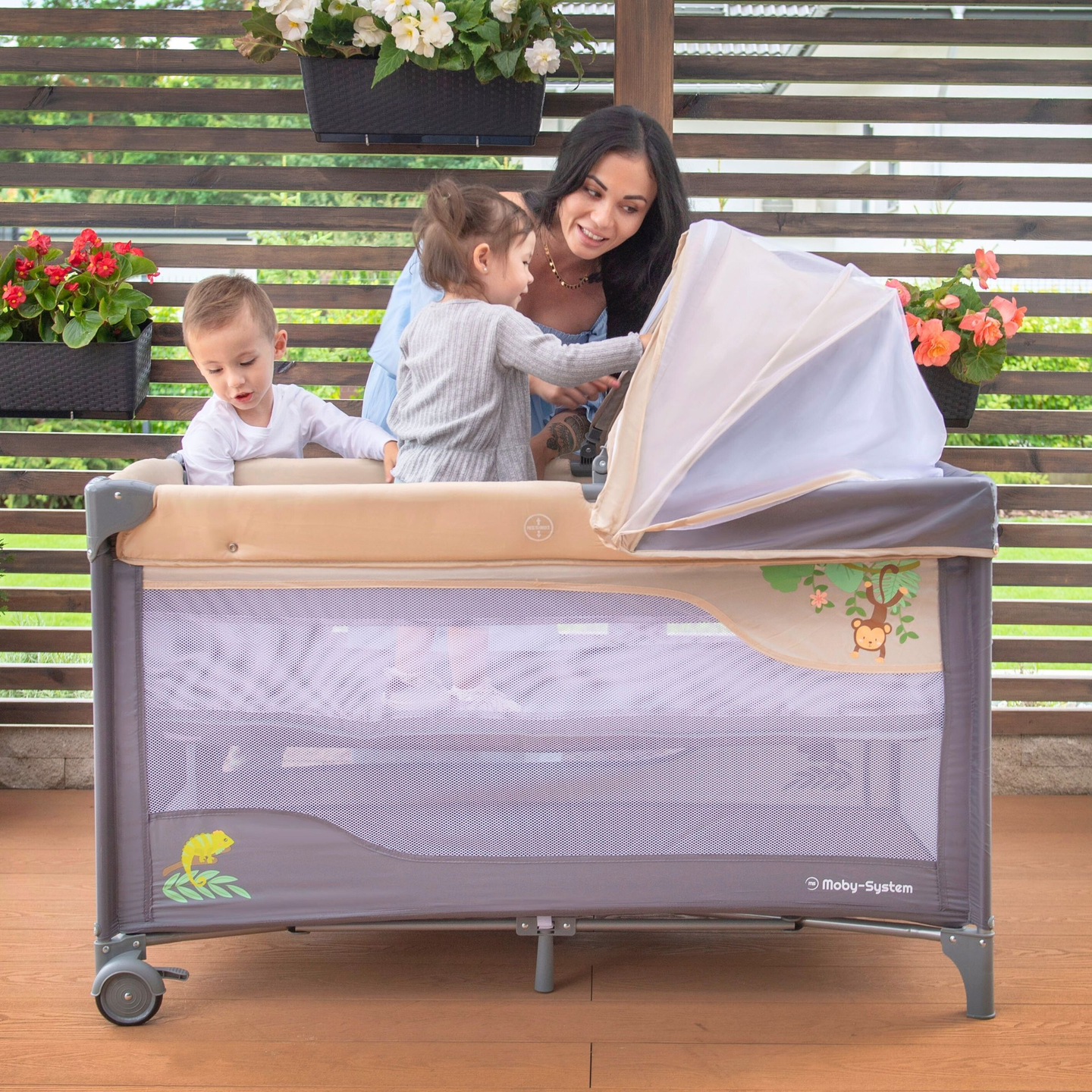 Potovalna posteljica 0 - 36 m s previjalno mizo + ograja Moby-System HUXLEY