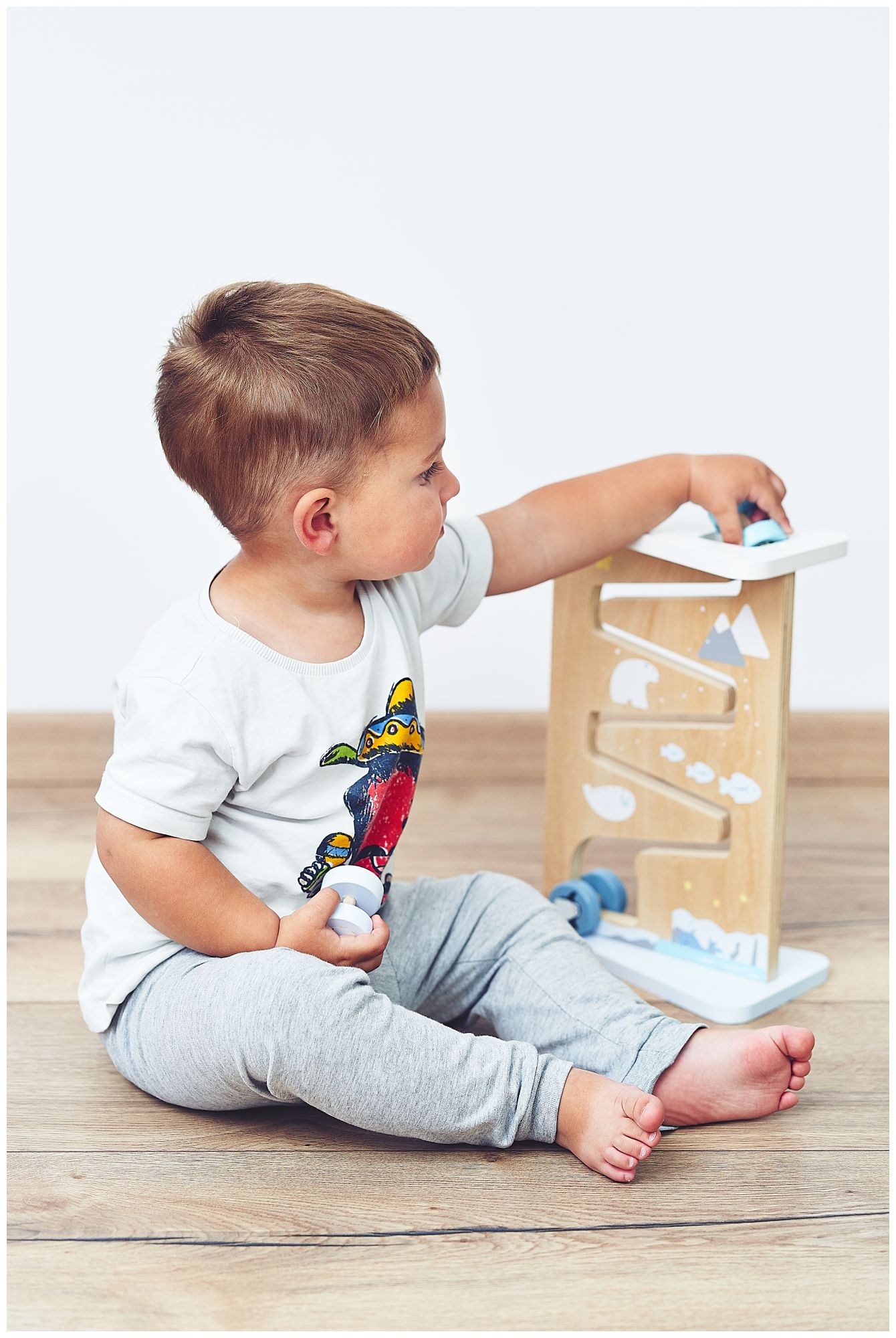 Lesena obojestranska senzorična manipulativna tabla